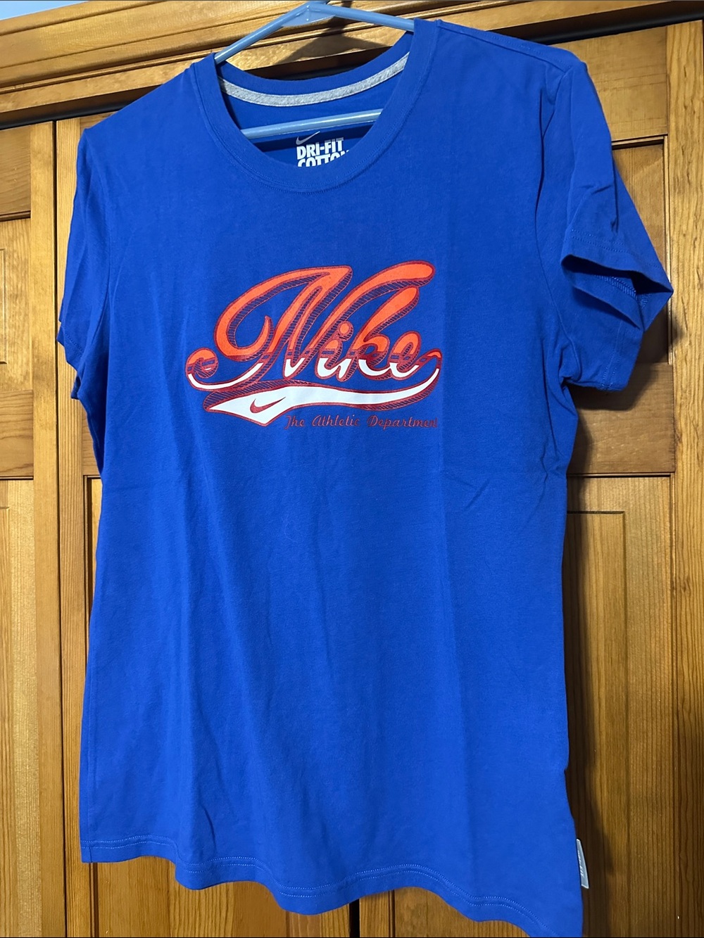 Nike Women’s Royal Blue Short-Sleeve Tee with Orange Script Logo